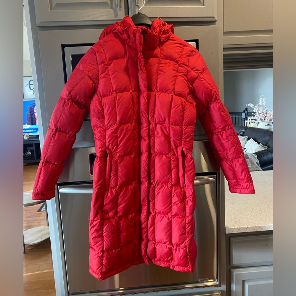North Face. Worn but great shape red puffer coat size medium.